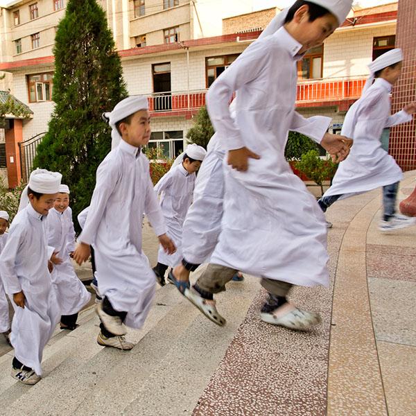 Muslim children going to the evening madrasah.