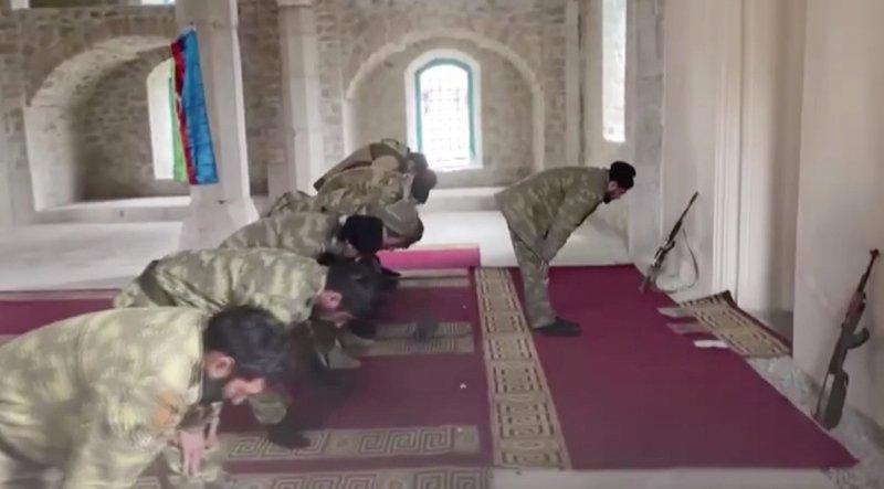 Soldiers performing the Friday prayer in Shusha mosque